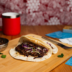 Campers Pantry Slow Cooked BBQ Beef Brisket. Freeze dried for a lightweight high protein hiking food meal. Served here in a soft taco with slaw.