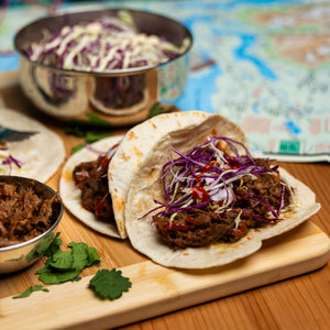 Campers Pantry freeze dried Chipotle Pulled Beef. Slow cooked and then freeze dried for a perfect lightweight hiking food option. Served here in soft tacos and slaw.