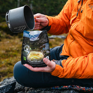 Campers Pantry Cheesy Chive Mash rehydrated with hot water from a Jetboil stove. Lightweight hiking food options for your next adventure.