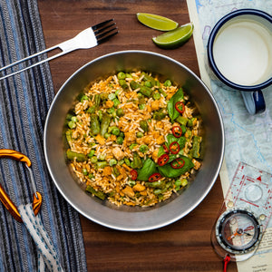 top down image of a Campers Pantry Red Thai Curry hiking food. Lightweight adventure food to fuel your next hiking trail. Now in our ultra-lightweight MK II expedition packaging—same bold flavors, less bulk!

Spice up your adventure with our Red Thai Chicken Curry—a flavor-packed feast with tender chicken, a punchy blend of Thai spices, and a luxuriously creamy coconut milk base. Infused with fiery red curry paste and served over fragrant jasmine rice, this meal brings the heat and comfort in every bite. 🌶